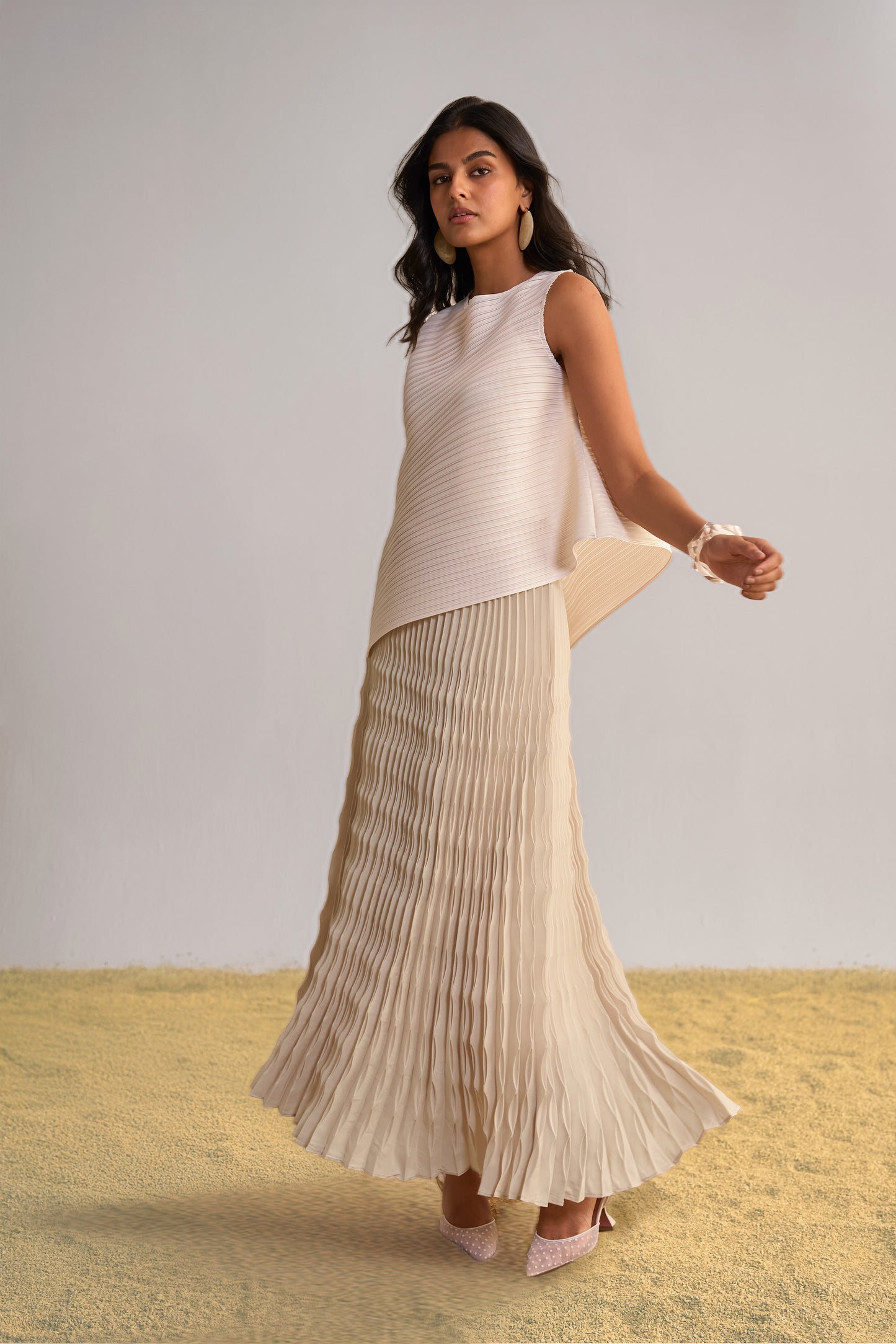 IRREGULAR PLEATED MAXI SKIRT