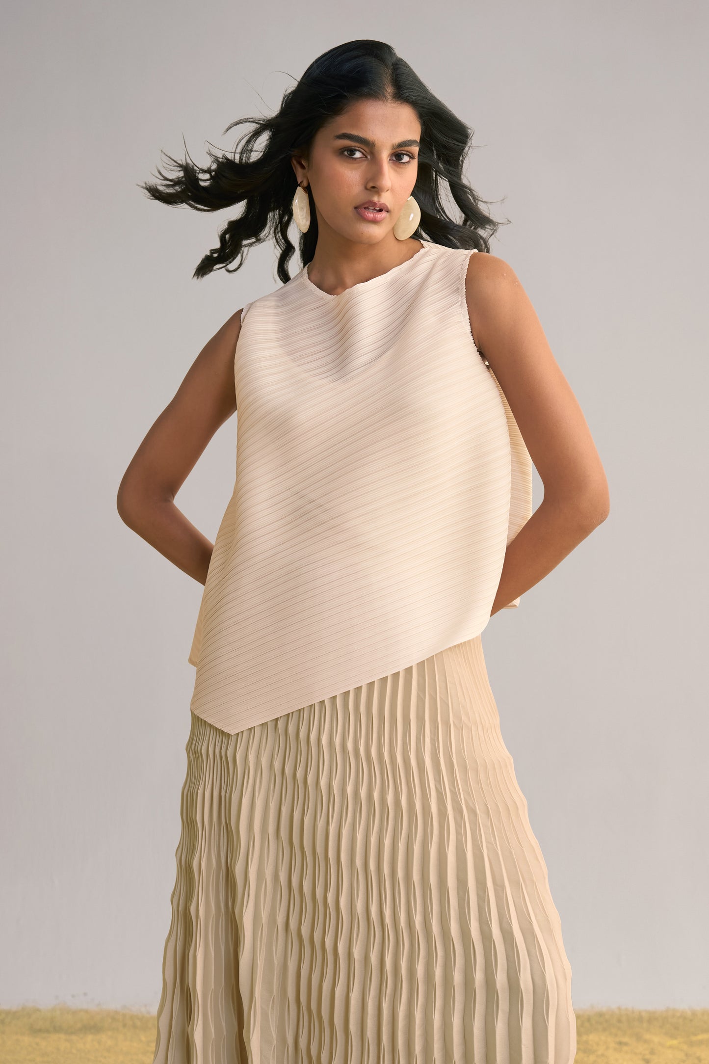 IRREGULAR PLEATED MAXI SKIRT