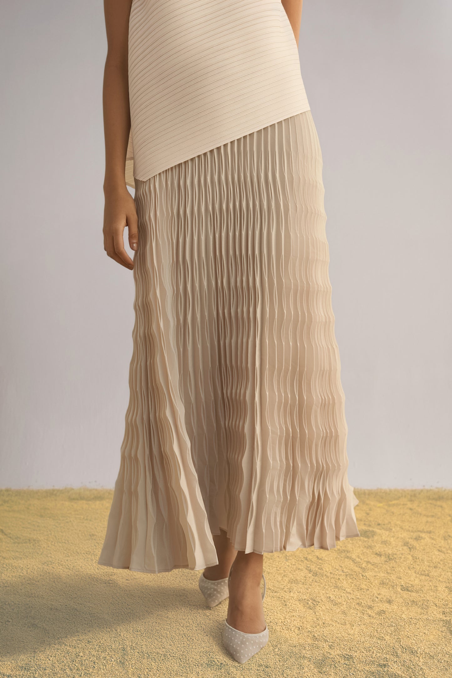 IRREGULAR PLEATED MAXI SKIRT