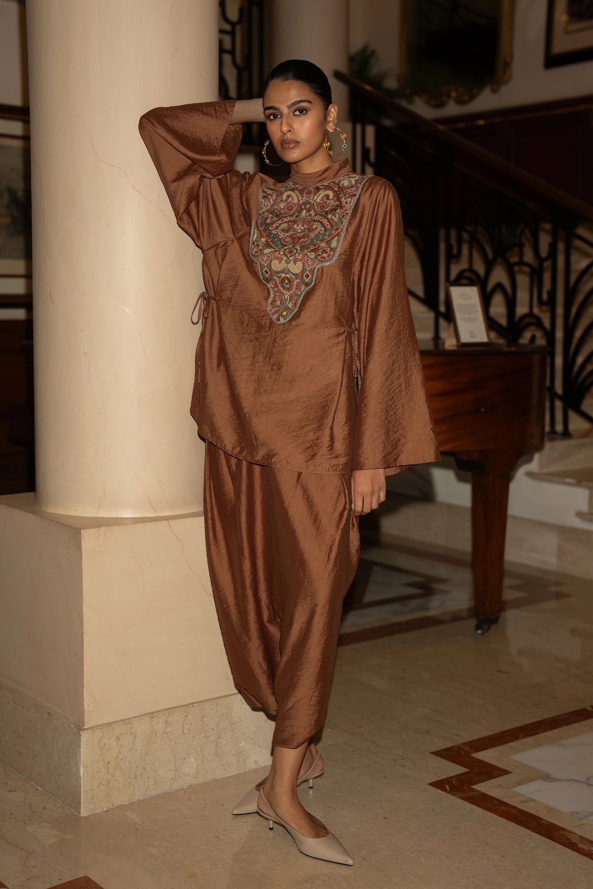 EMBROIDERED BIB TOP & FLOWING PLEATED SKORT